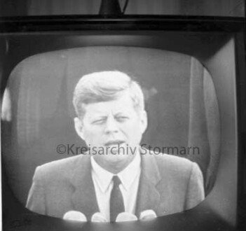 Kreisarchiv Stormarn, TV screen: John Fitzgerald Kennedy, ph. Hans Mallek (1963), available here
