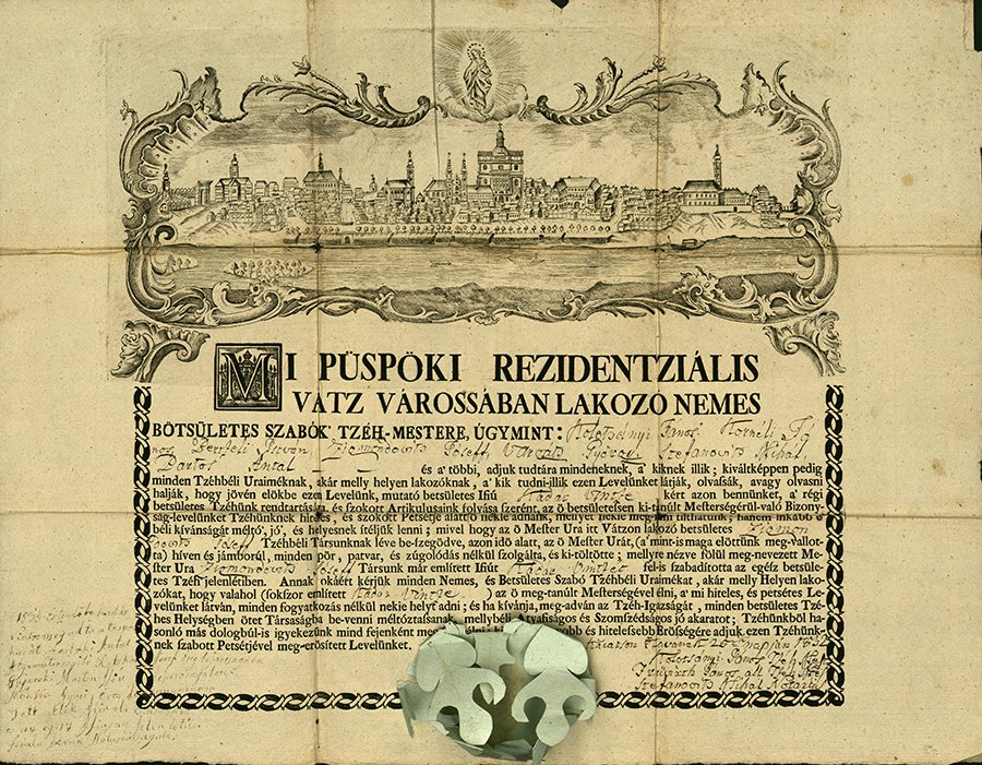 The tailor guild of Vác gives Vince Kádár, tailor boy of Verőce, the freedman's tag, after fulfilling the apprenticeship. According to later inscription, the boy gave the pledge during the year of 1833.