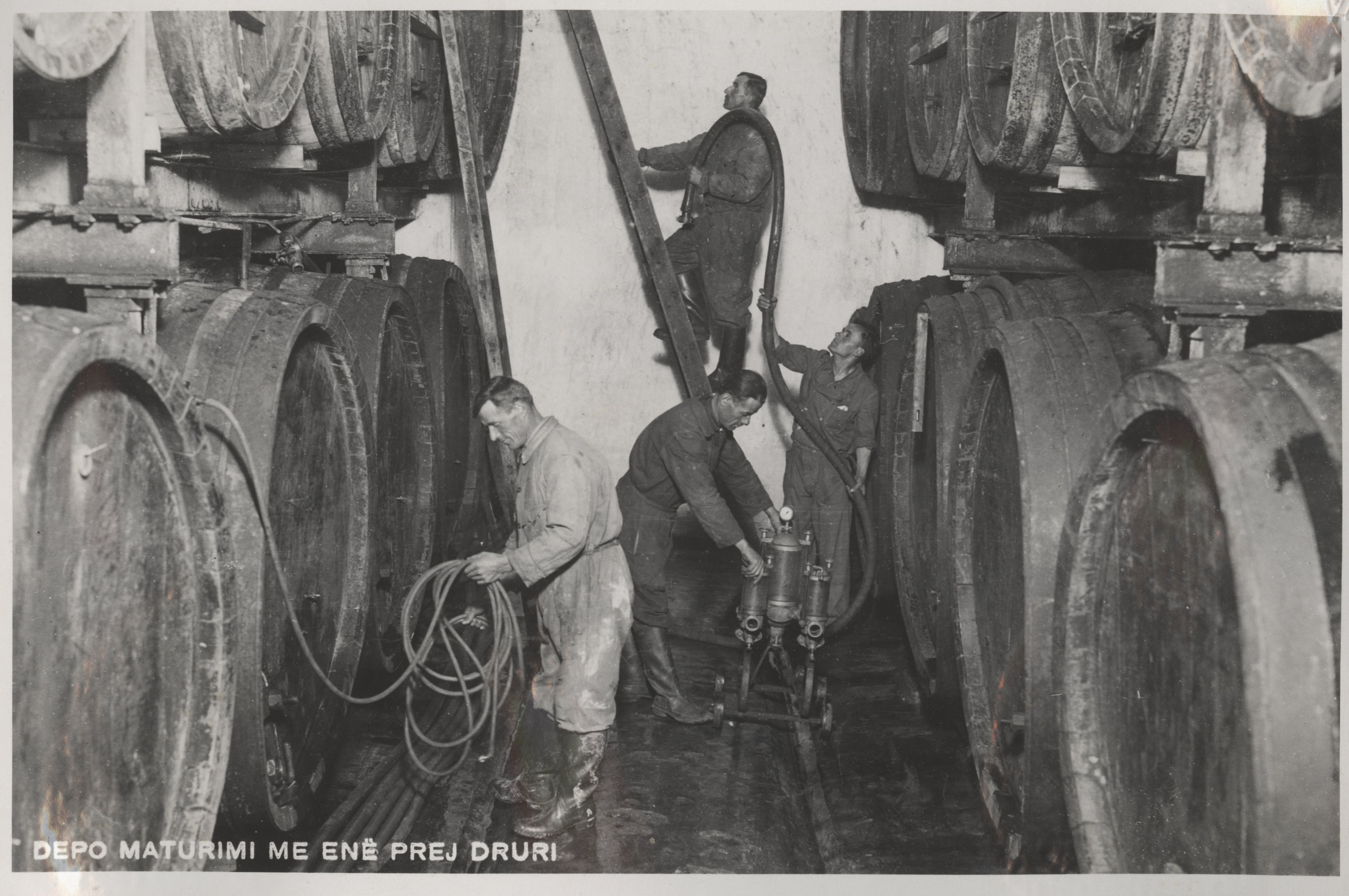 Wooden barrels where beer is matured at Korça Beer Brewery (after 1934 - before 1944) - Photographic Studio MAK - National Museum of Albania (prior to 1944)